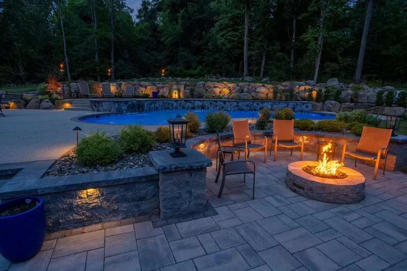 Blue Tree pool and outdoor living project at dusk in Pottstown, Pennsylvania.